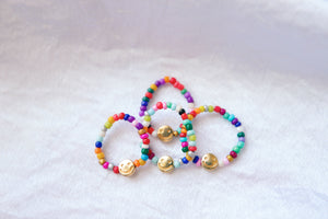Smiley face seed beaded rings