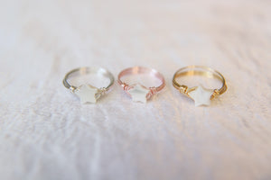 Mini wire wrapped mother of pearl star rings